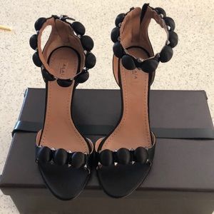 Alaia satin bombe heels